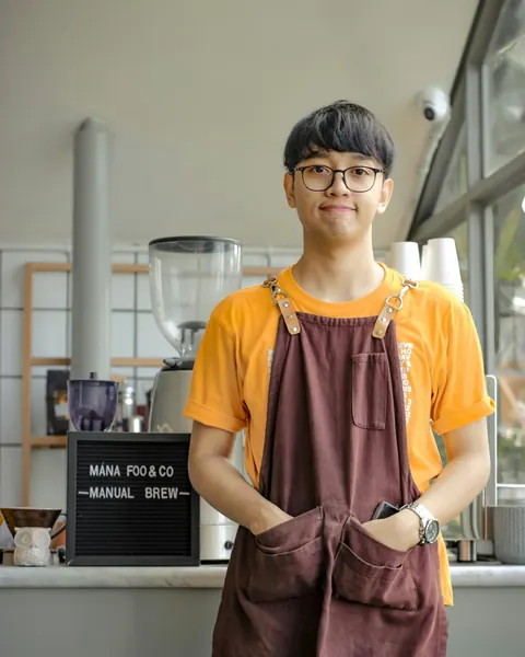 Barista behind the counter